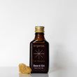 Load image into Gallery viewer, Glass bottle with metal gold lid containing Arganic argan beard oil 30ml