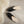 Load image into Gallery viewer, Leather handmade Egyptian slippers, midnight black leather on top and tan leather sole, white hand stitching through the black leather, pointed toe and flat sole
